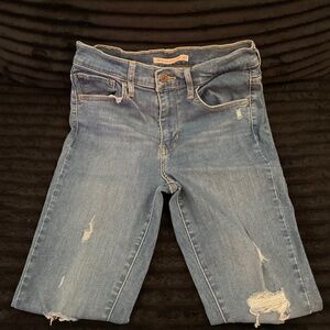 Levi’s Medium Blue Distressed Jeans